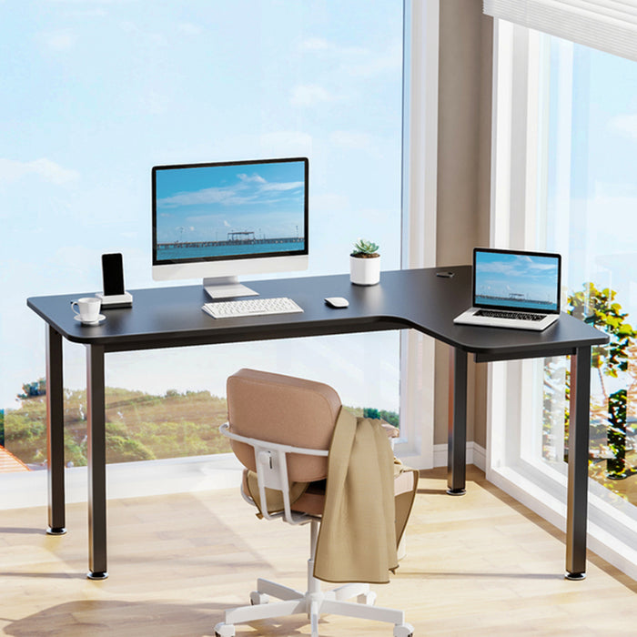 Right-sided L01 60" L-Shape Desk in a simple office setting with a few peripherals on top.