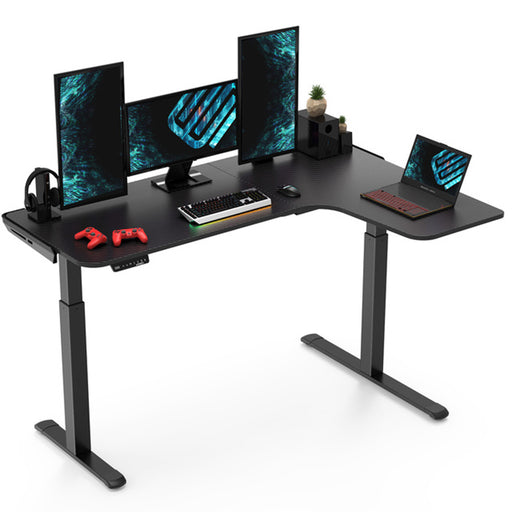 L-Shaped Electric Standing Desk Right-sided with gaming peripherals on top of it.