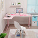 Left-sided Pink L-Shape Desk in a simple realistic room setting with a few peripherals on top.