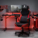 Red Warzone Gaming Chair in a realistic red-backlit gaming room.