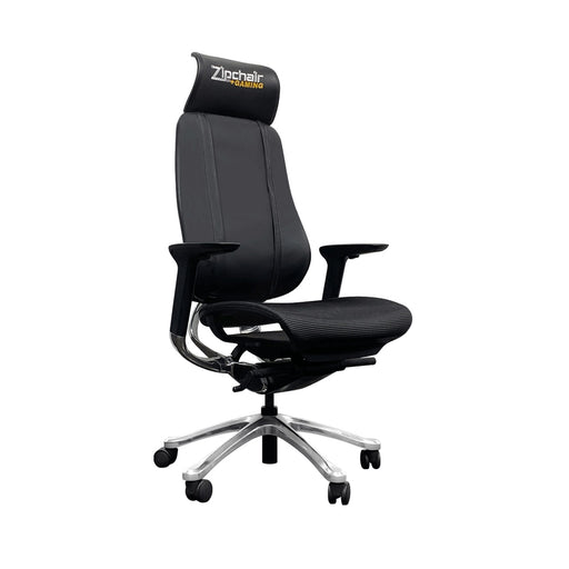 DreamSeat PhantomX Gaming Chair. Chair is all black with handrests and headrest. Sits on a silver base with wheels on the ends of 4 arms.
