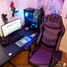 This is the image of the purple/black TS-61 Ergonomic High Back Racer Style Video Gaming Chair in front of a simple PC gaming set-up.